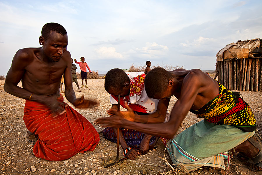 Samburu tribesmen making fire   Kenia